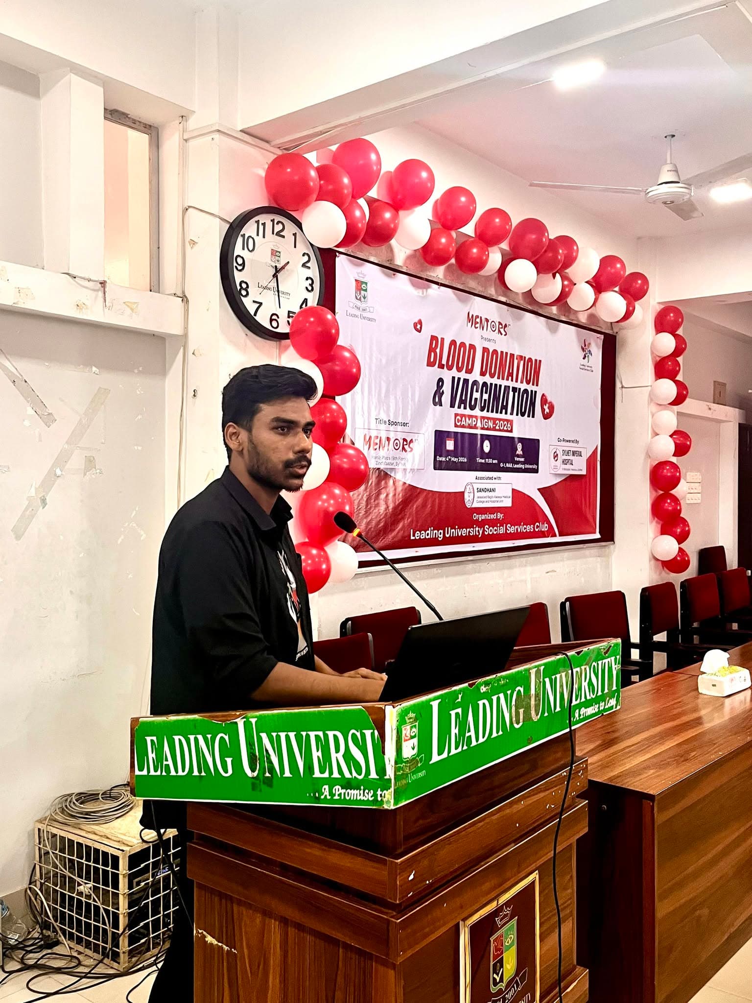 Badar Hossain, Co-Founder and Chief Operating Officer of Ravenence Limited — speaking at the Blood Donation & Vaccination Campaign, Leading University Social Services Club